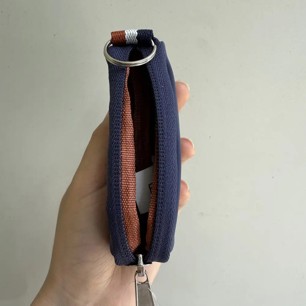 WILSON ROLAND GARROS KEY CHAIN BAG - COMPACT STYLE FOR TENNIS ENTHUSIASTS